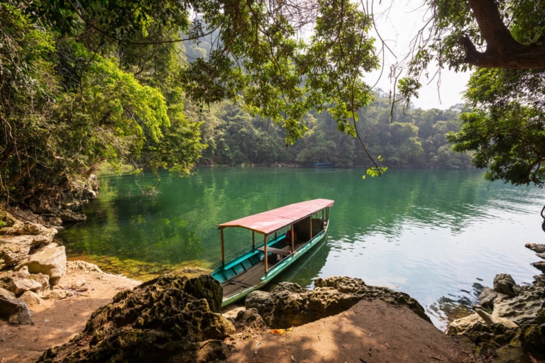 wooden-boat-moored-shores-ba-be-lake-vietnam
