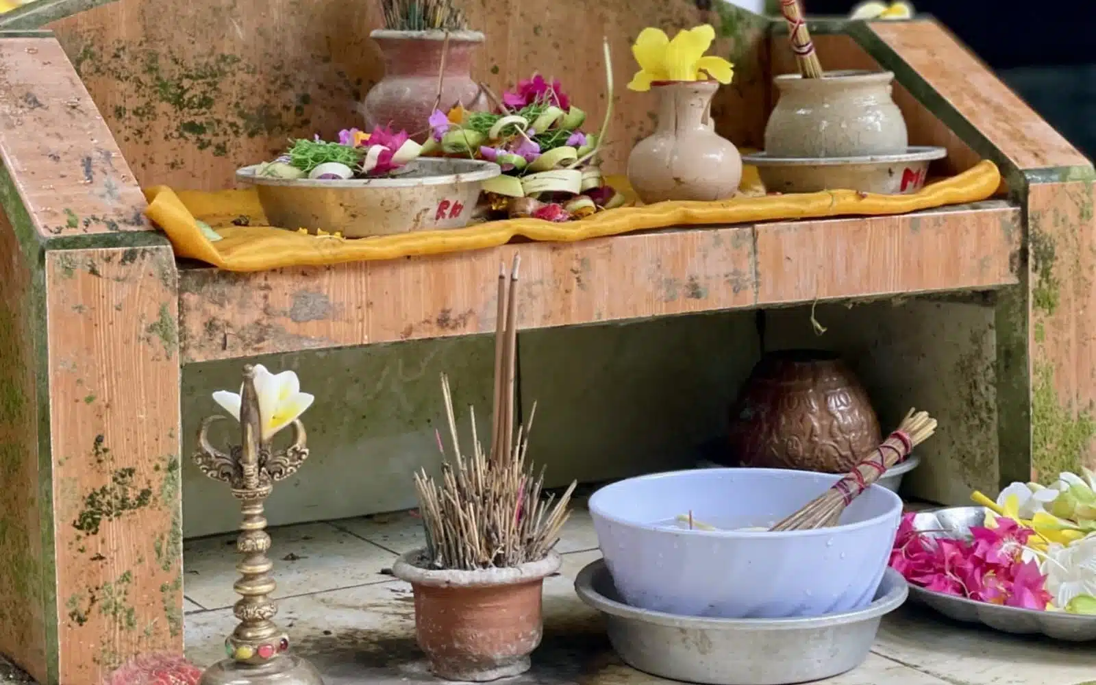 canang sari offerings waterfall melukat bali