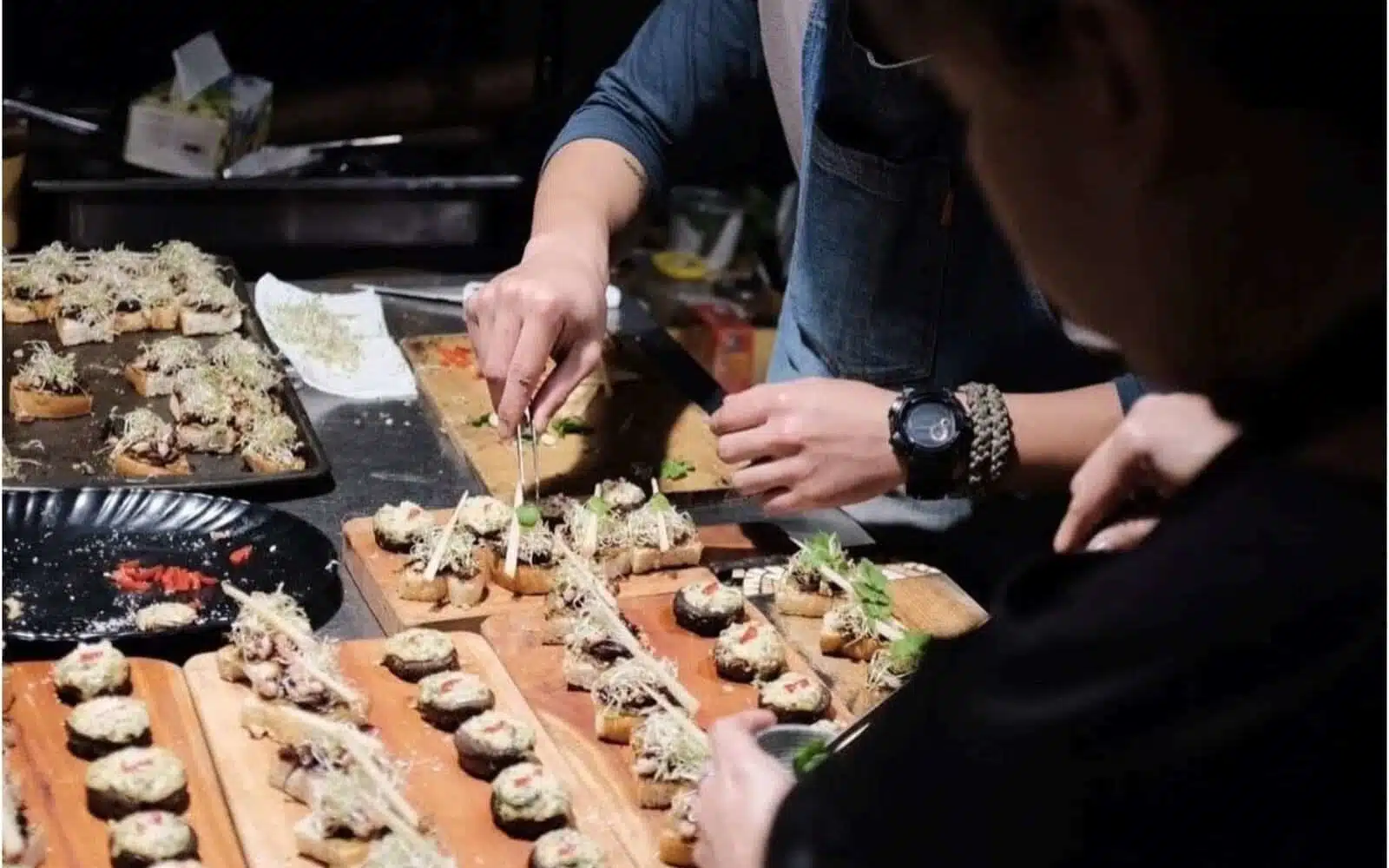 chef decorating tapas microgreens catering philippines