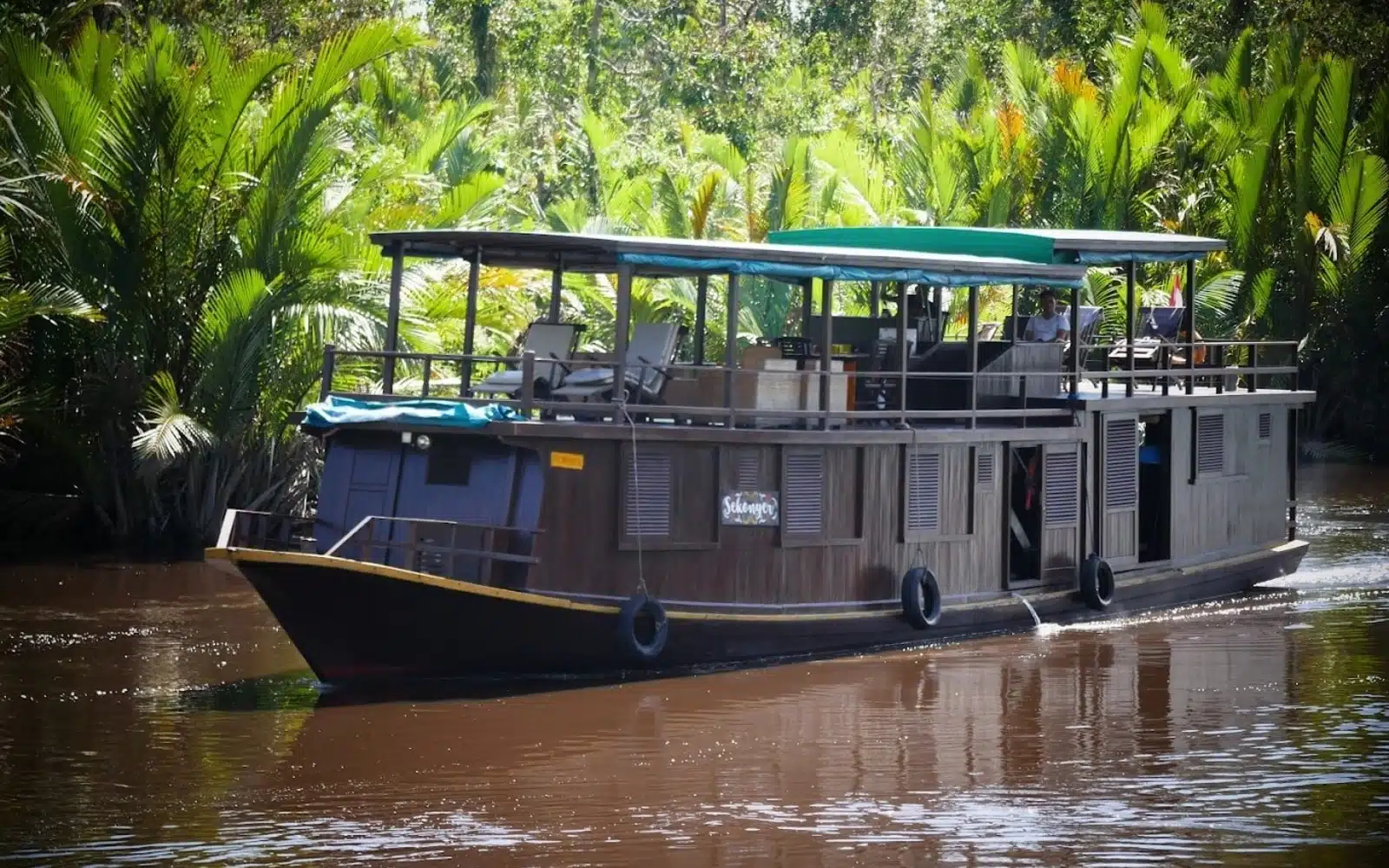 traditional klotok river cruise tanjung puting national park